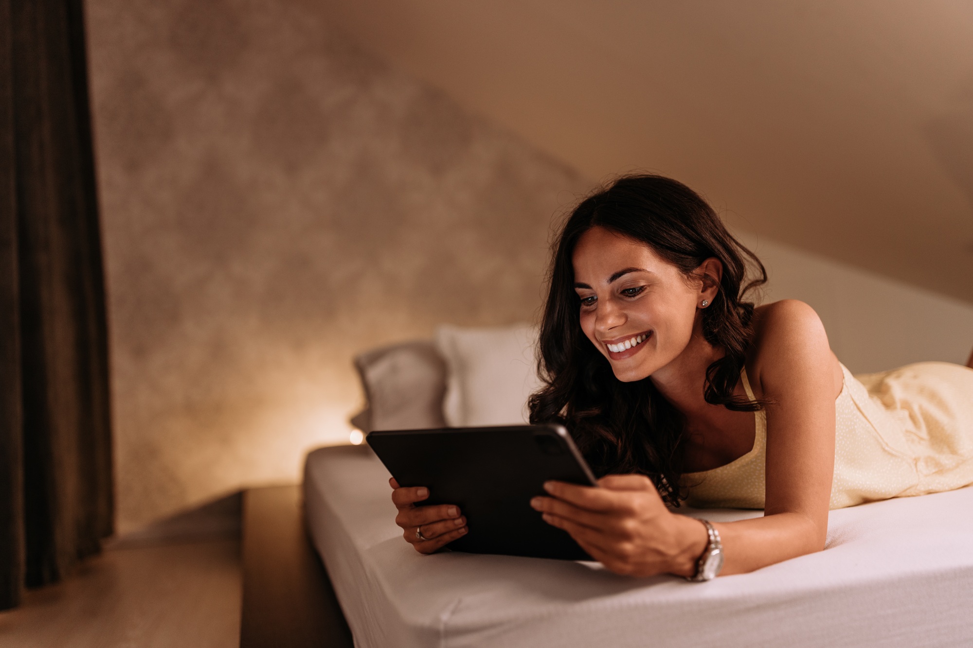 Happy woman, wishing her boyfriend goodnight.